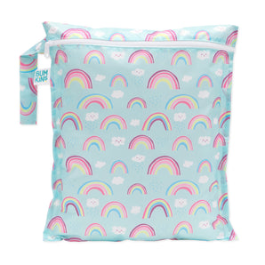 Bumkins Wet Bag: Rainbows features a colorful rainbow and cloud design on light blue waterproof fabric with a side handle and zipper closure.