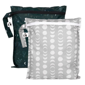 Roamio by Bumkins Wet Bag 2 Pack: Desert Night—one gray waterproof bag with white moon phases, one green waterproof bag with cacti.