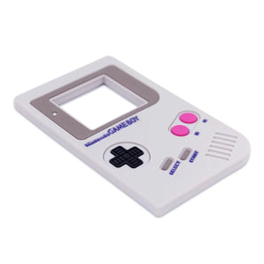 Bumkins Silicone Teether: Game Boy™ is a gray food-safe silicone teether shaped like a retro video game console.